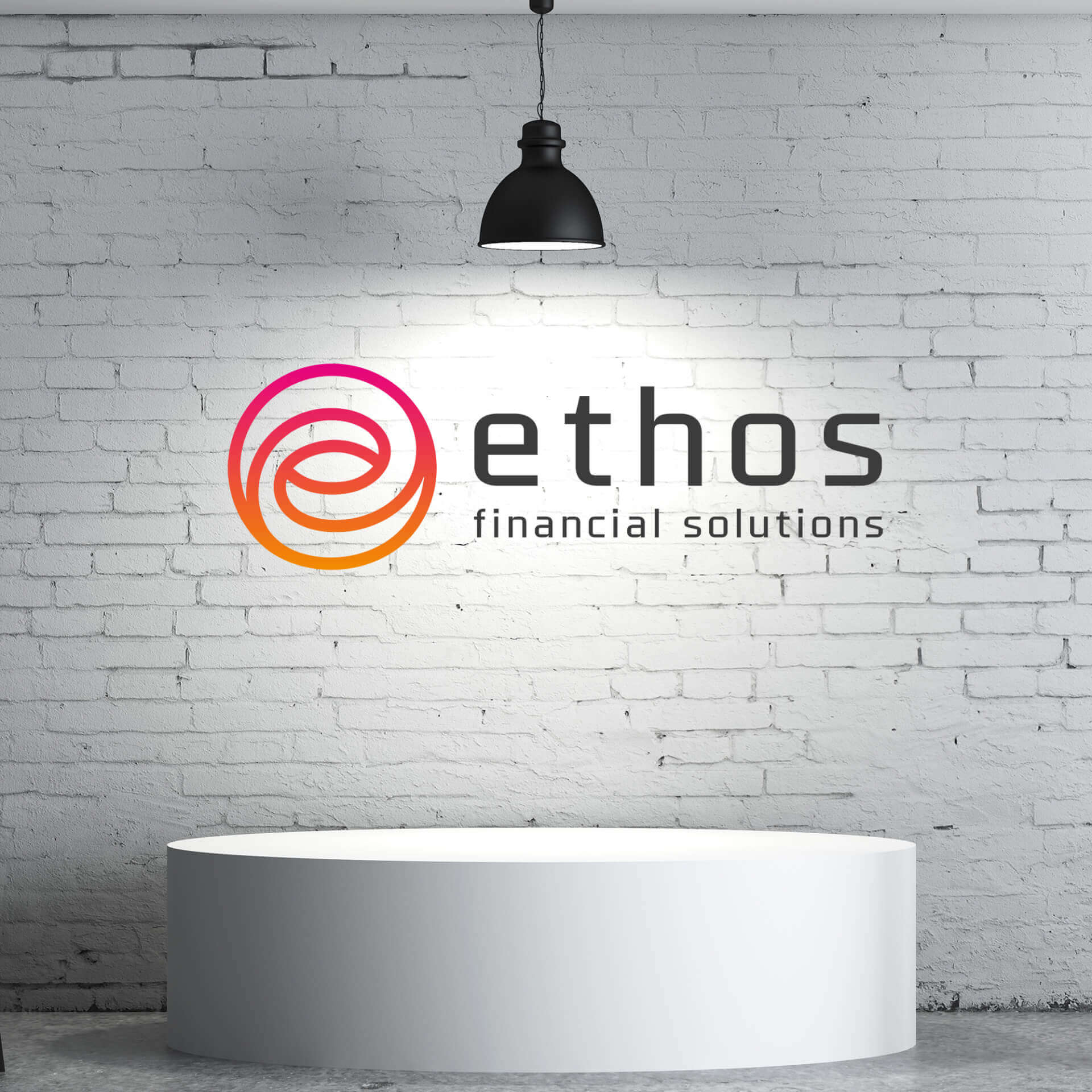 Ethos Logo printed on a wall