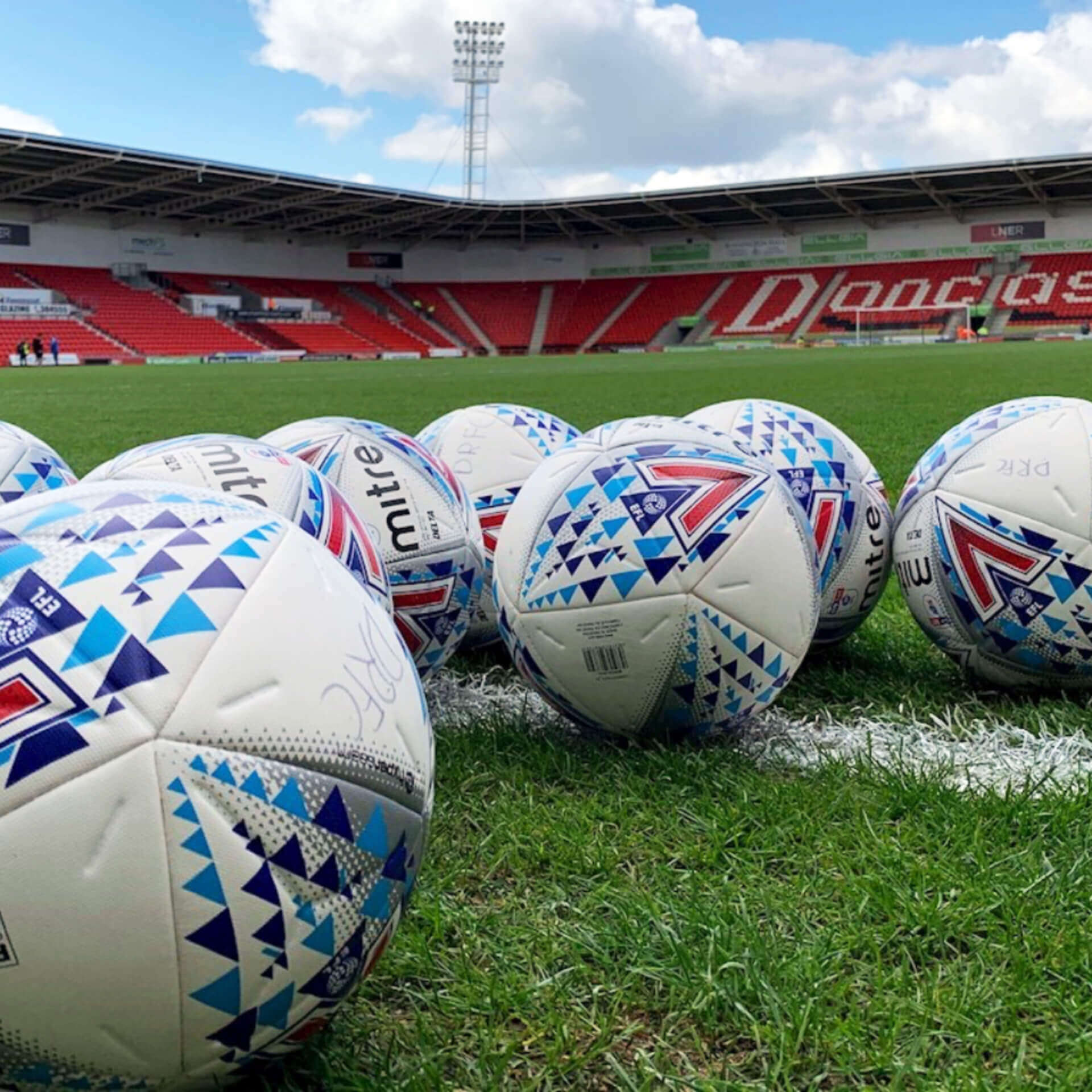 Footballs on the Doncaster Rovers Pitch