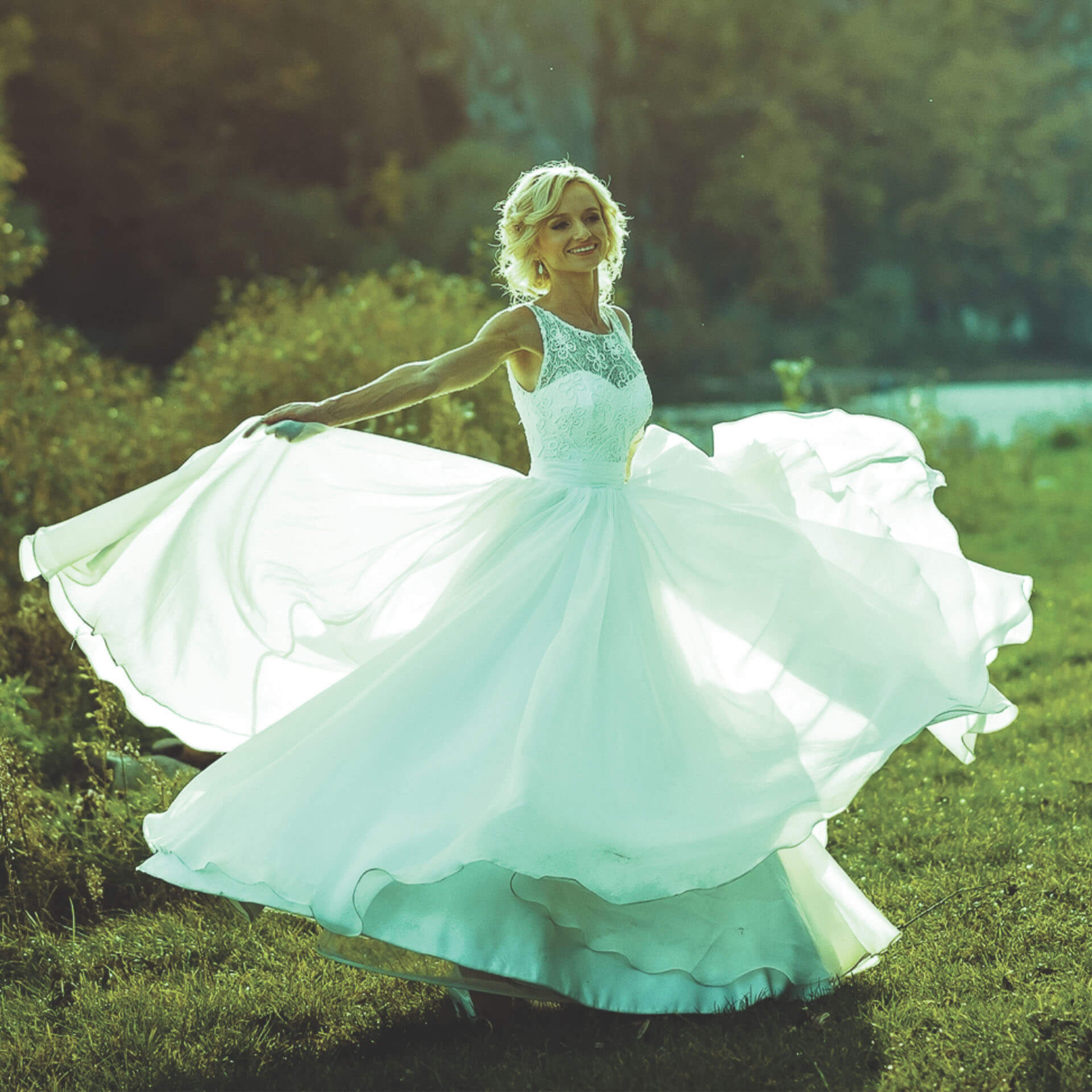 Women in flowy dress in a garden